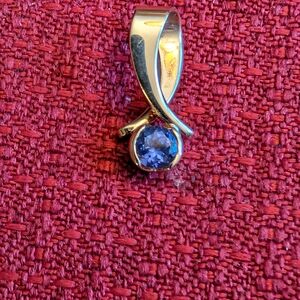 Elegant Gold Necklace with Blue Gemstone